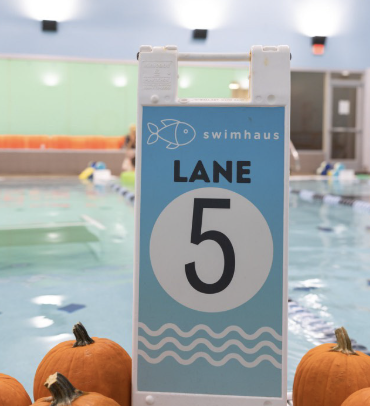 Spooky Splash: Floating Pumpkin Pool Party
